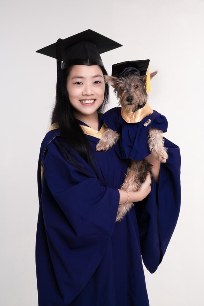 girl and dog double graduation