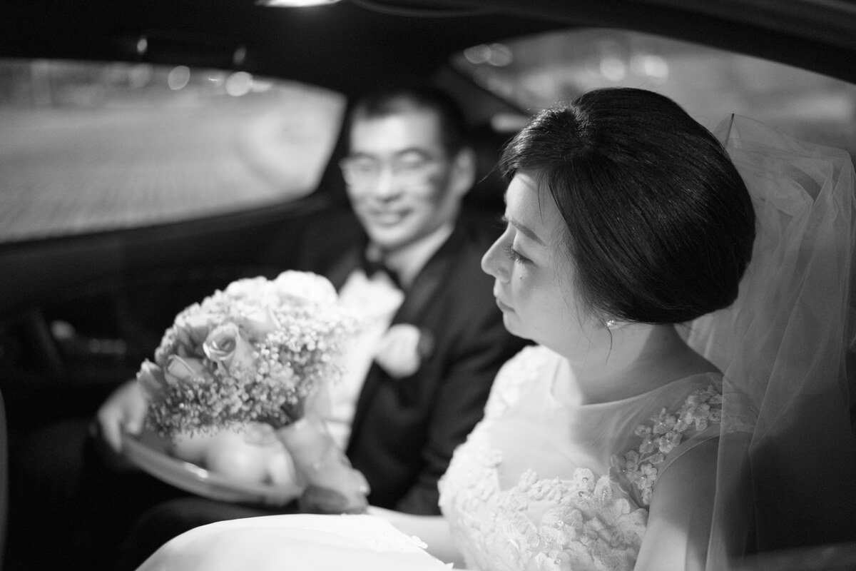 Wedding couple in car
