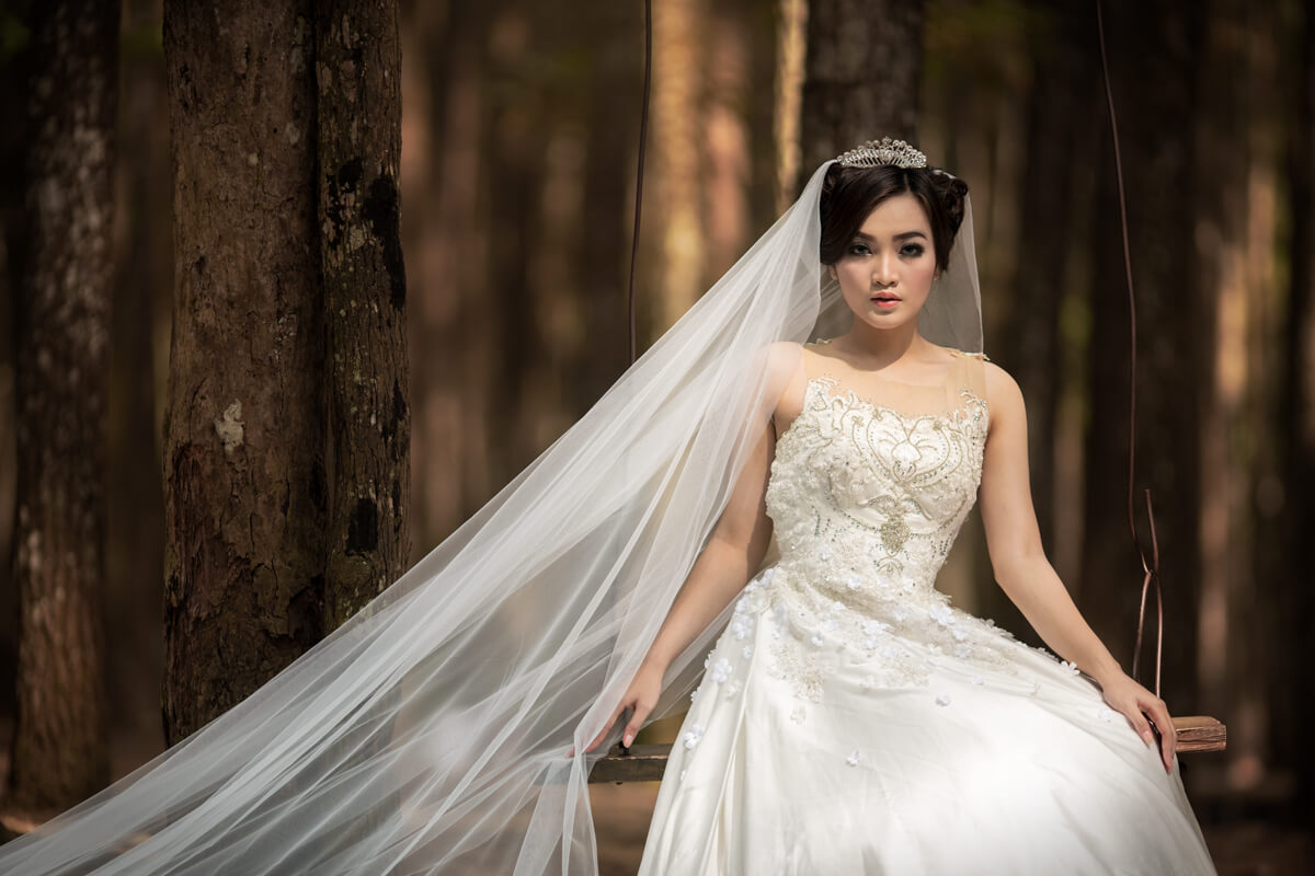 bride in pinetree forest in jogja