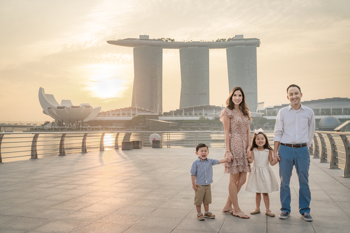 family with crying boy