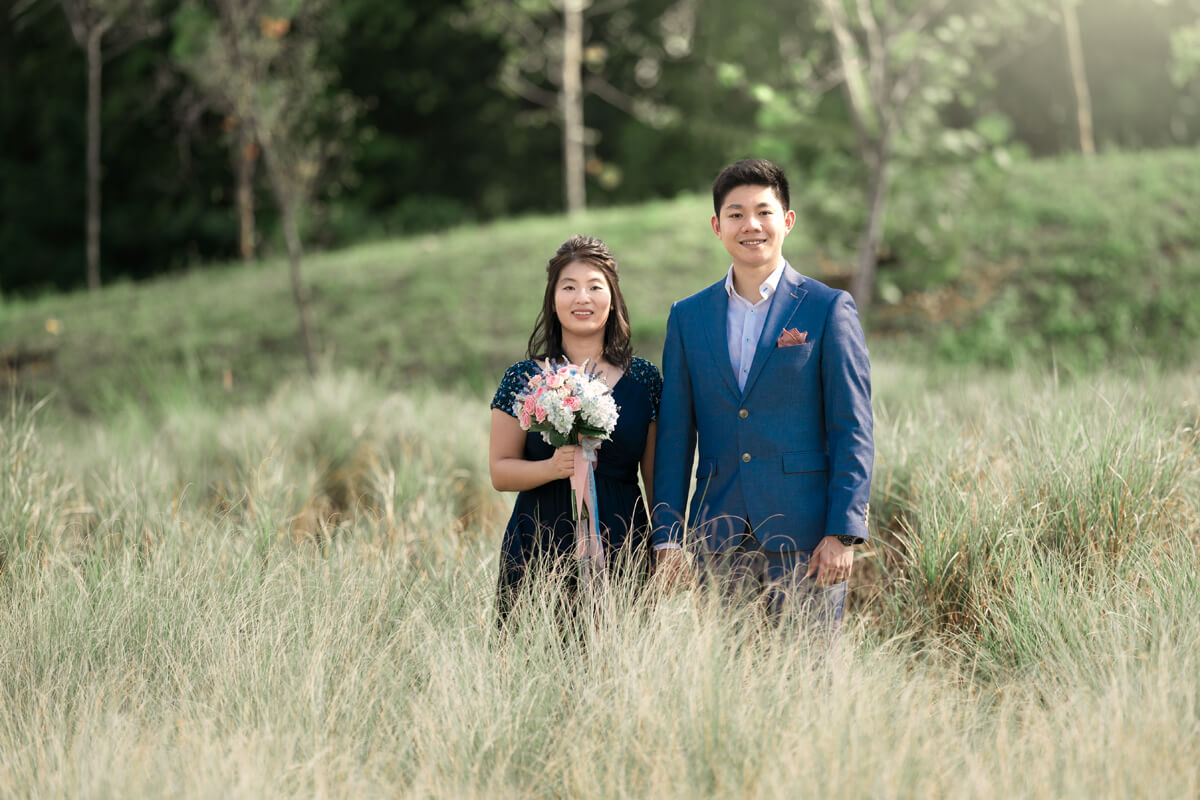wedding couple in grass