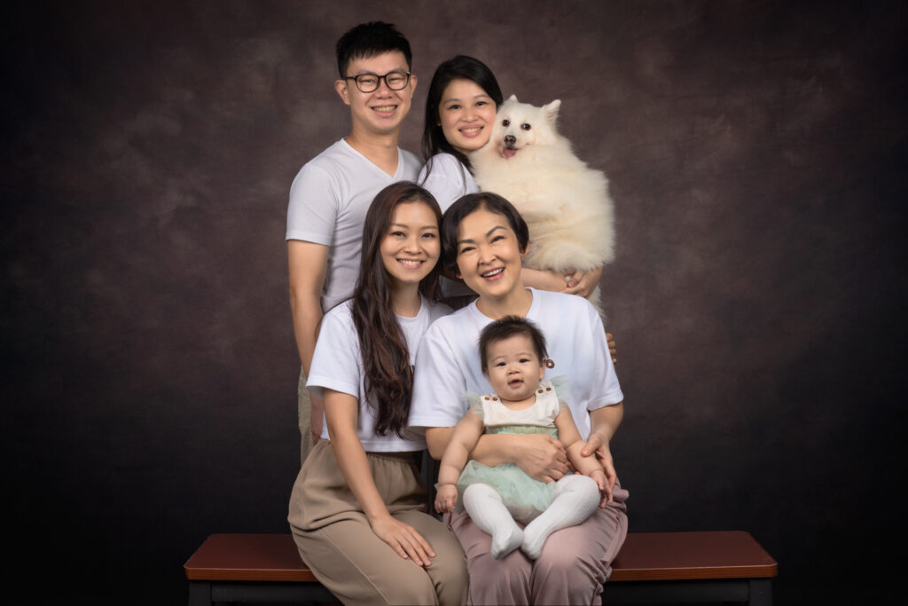 Singaporean family enjoying a fun photoshoot session.